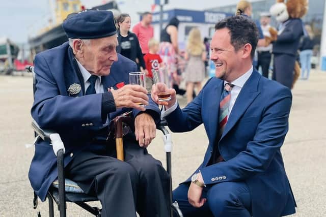 Stephen Morgan, MP for Portsmouth South, with a veteran during the D-Day 80 commemorations organised by the Portsmouth Historic Quarter