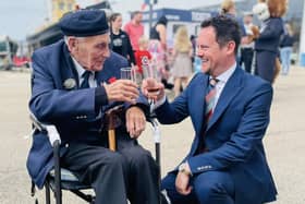 Stephen Morgan, MP for Portsmouth South, with a veteran during the D-Day 80 commemorations organised by the Portsmouth Historic Quarter