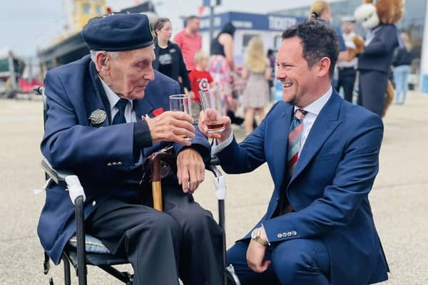 Stephen Morgan, MP for Portsmouth South, with a veteran during the D-Day 80 commemorations organised by the Portsmouth Historic Quarter