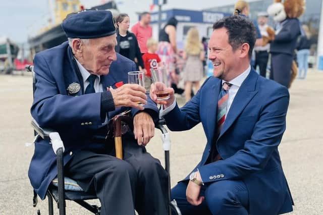 Stephen Morgan, MP for Portsmouth South, with a veteran during the D-Day 80 commemorations organised by the Portsmouth Historic Quarter