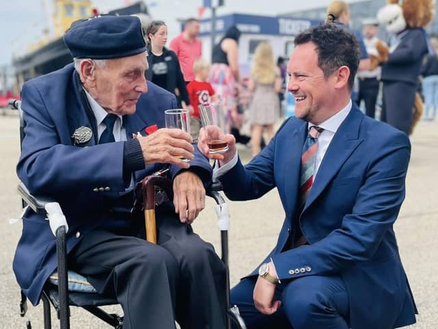 Stephen Morgan, MP for Portsmouth South, with a veteran during the D-Day 80 commemorations organised by the Portsmouth Historic Quarter