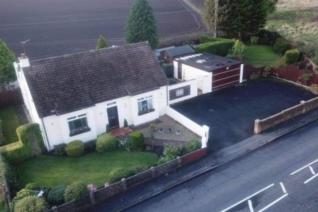 Aerial view of front of property.