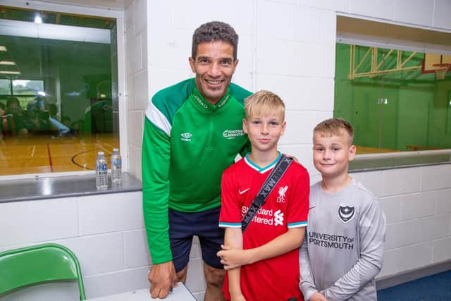 Pictured: David James with a couple of his fans at Bay House School, Gosport, at a football festival. Picture: Habibur Rahman.