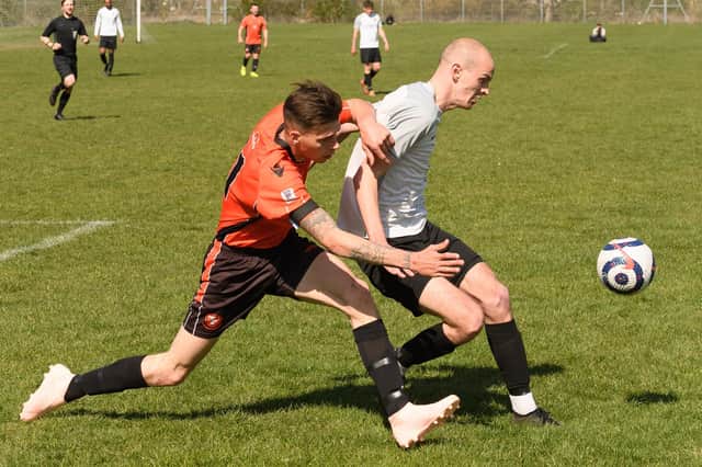Ian Cole (AFC Portchester Reserves, left) and Seagull's Harry Birmingham during their Division 2 match at King George V. Pic: Keith Woodland.