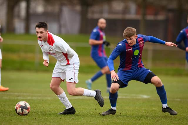 Tommy Tierney, left, hit a hat-trick as Horndean caned Hamble Club 6-0.
Picture: Keith Woodland