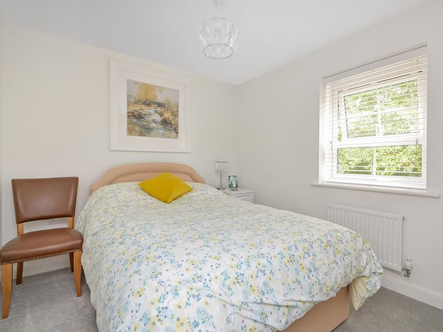 This three bedroom property is on the market at a guide price of £415,000. It is listed by Town and Country.