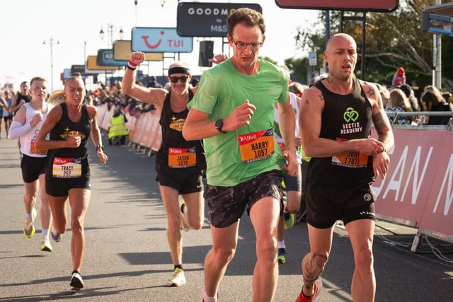 Pictured is: Runners cross the line to finish

Picture: Keith Woodland (151021-591)