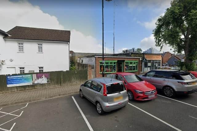 The woman was attacked outside The Squirrels antique shop, in New Street, Basingstoke. Picture: Google Street View.