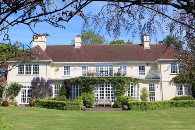 This home has 12 bedrooms, 11 bathrooms and five reception rooms and it is situated in a beautiful area of the countryside.