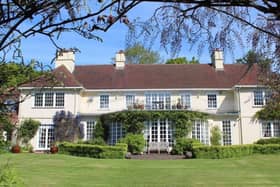 This home has 12 bedrooms, 11 bathrooms and five reception rooms and it is situated in a beautiful area of the countryside.