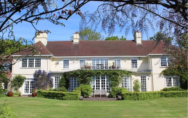 This home has 12 bedrooms, 11 bathrooms and five reception rooms and it is situated in a beautiful area of the countryside.