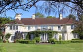 This home has 12 bedrooms, 11 bathrooms and five reception rooms and it is situated in a beautiful area of the countryside.