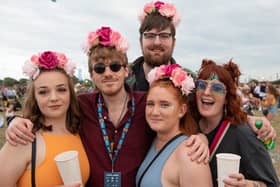 A group of friends from Gosport and London with flowery headdresses. Picture: Vernon Nash (280821-164)