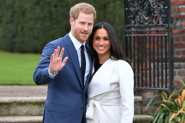 File photo dated 27/11/17 of Prince Harry and Meghan Markle in the Sunken Garden at Kensington Palace, London, after the announcement of their engagement. PA Photo. Issue date: Sunday December 15, 2019. See PA story XMAS Decade. Photo credit should read: Dominic Lipinski/PA Wire