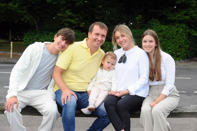 Ukrainian family living in Gosport.

Pictured is: Volodymyr Kulynych (47) with wife Lilya (39) and their three children (l-r) Marko (16), Melisa (20 months old) and Anna (15).

Picture: Sarah Standing (230822-8916)