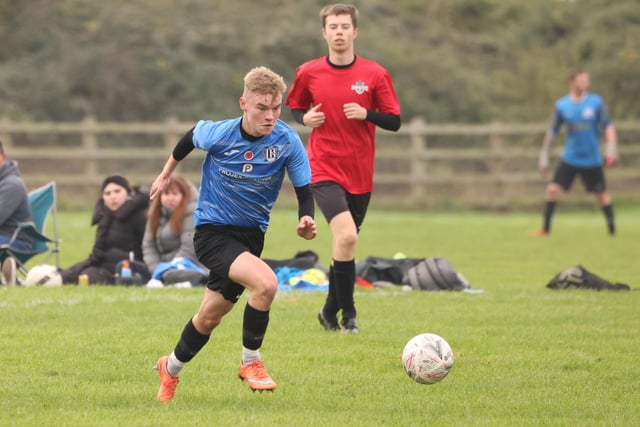 Waterlooville Wanderers Reserves' George Howden scores one of his four goals in an Adelaide Cup second round tie against Milton Park Rangers. Picture by Kevin Shipp