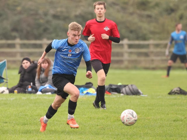 Waterlooville Wanderers Reserves' George Howden scores one of his four goals in an Adelaide Cup second round tie against Milton Park Rangers. Picture by Kevin Shipp