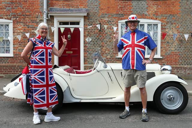 Jacqueline and Nigel Coole with a BMW Roadster.
