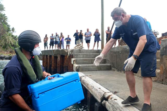 Surg Lt Mills delivers Covid-19 vaccines to Pitcairn Islands. 
