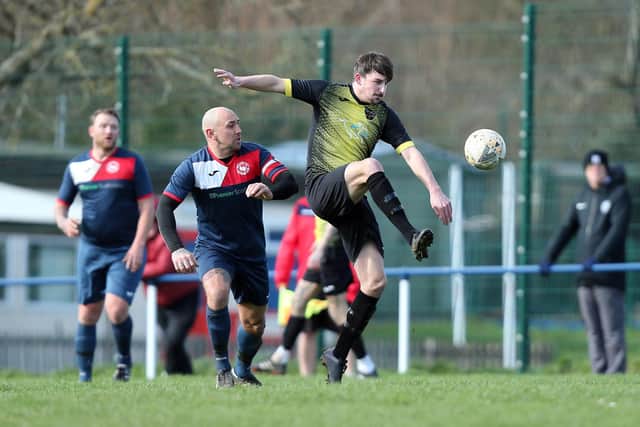 Infinity (yellow/black) in action at Paulsgrove last month. The team have not lost any of their 24 Hampshire Premier League games so far. Picture: Chris Moorhouse