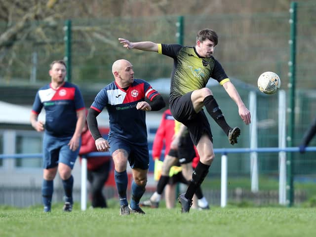 Infinity (yellow/black) in action at Paulsgrove last month. The team have not lost any of their 24 Hampshire Premier League games so far. Picture: Chris Moorhouse