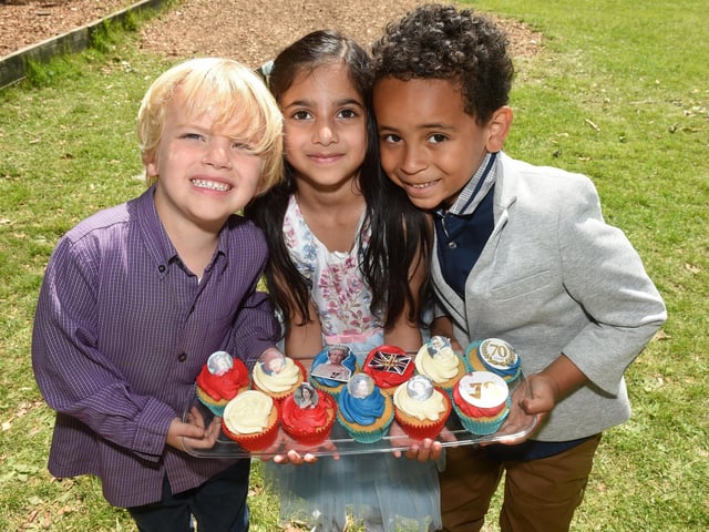 Alverstoke Infant School celebrating The Queen's Platinum Jubilee. From left: Cameron Leeming (4), Ava Rebelo (5) and Ollie Pereira Zhakata (5).