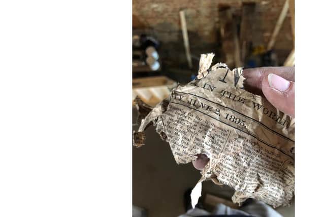 Newspaper from the 19th century was found in the walls during the renovation. Picture: Drift