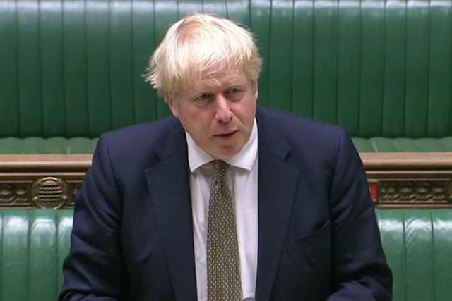 Prime Minister Boris Johnson making a statement in the House of Commons in London, setting out a new three-tier system of controls for coronavirus in England. PA Wire