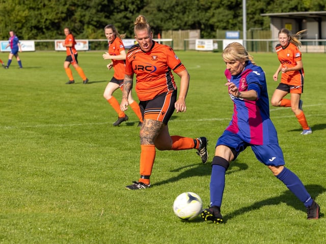USP's Joanne Oliver and Portchester's Sam Atkinson-Jennings. Picture: Mike Cooter