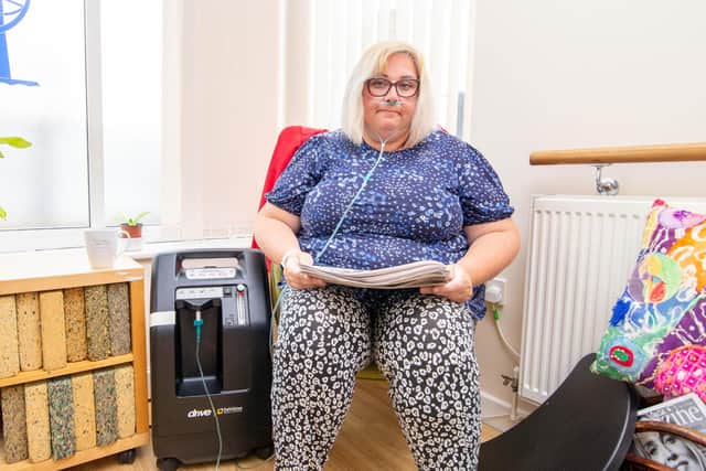 Michelle Holland-Washington on an oxygen concentrator
Picture: Habibur Rahman