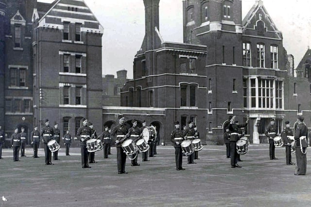 Victoria Barracks in ruins.In this view loaned again by Ray White we see members of the Air Training Crew 1190 Squadron on the parade ground of the burnt out part of Victoria Barracks in Old Portsmouth.Ray told us at the time the A.T.C. practised most Sunday's at this location as there was a superb parade ground available.