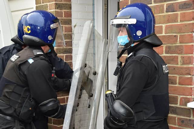 Two people have been arrested following drugs raids across the city.