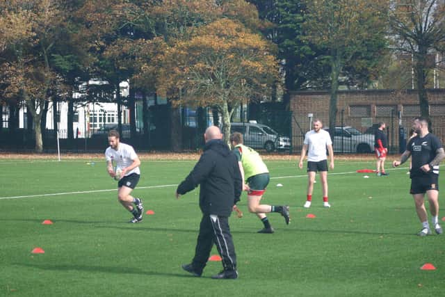 HMS Queen Elizabeth's ship's company have been testing out a raft of team sports to help gel them together ahead of their maiden deployment next year.