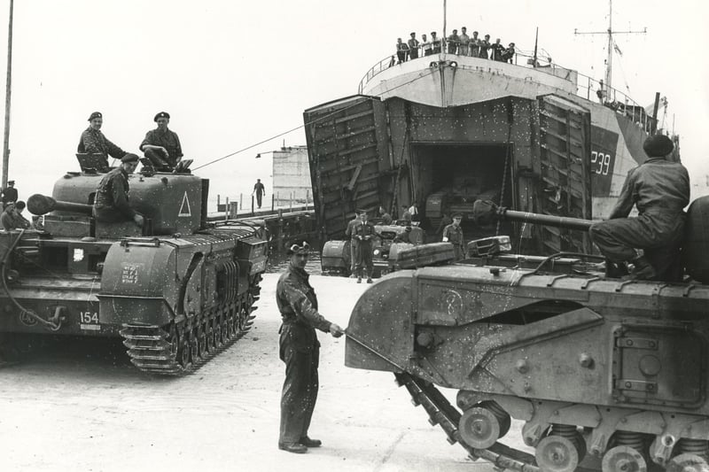 Loading Churchill tanks on L.S.T.s
(c) The News, War Series 2976