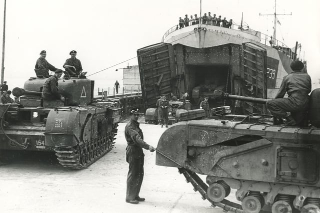 Loading Churchill tanks on L.S.T.s
(c) The News, War Series 2976