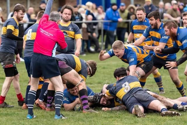 Jimmy Wallis adds another try for Gosport & Fareham beneath the bodies Picture: Martin Burnett