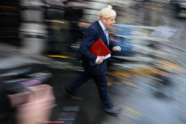 British Prime Minister Boris Johnson returns to number 10, Downing Street following the weekloy Cabinet meeting, on November 03, 2020 in London, England. The UK Prime Minister announced on Saturday that England is going into second national lockdown from November 5th. The House of Commons will debate and vote on the measures on Wednesday 4th November. (Photo by Leon Neal/Getty Images)