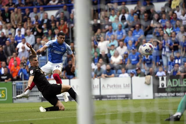 Dane Scarlett in the thick of the action against Peterborough, although on this occasion it didn't lead to a goal. Picture: Barry Zee