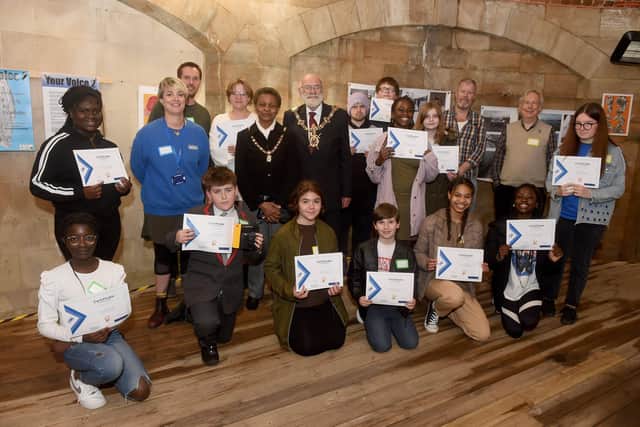 The Lord Mayor of Portsmouth Hugh Mason with the Lady Mayoress of Portsmouth Marie Costa and everyone who was involved in the Motiv8 workshop project. Picture: Sarah Standing (260522-8309)
