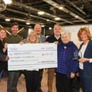 Portsmouth Business Networking Event organiser Penny Pilmoor, along with business owners Phil Mundy, Patricia Wakeford, Chris Handley, Lincoln Noel, Gayle Tong and Fiona Heath presented a cheque to Luke Knight of Dementia Support for £4521. Photos By Alex Shute