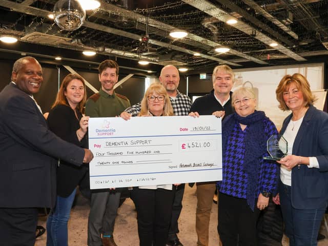 Portsmouth Business Networking Event organiser Penny Pilmoor, along with business owners Phil Mundy, Patricia Wakeford, Chris Handley, Lincoln Noel, Gayle Tong and Fiona Heath presented a cheque to Luke Knight of Dementia Support for £4521. Photos By Alex Shute