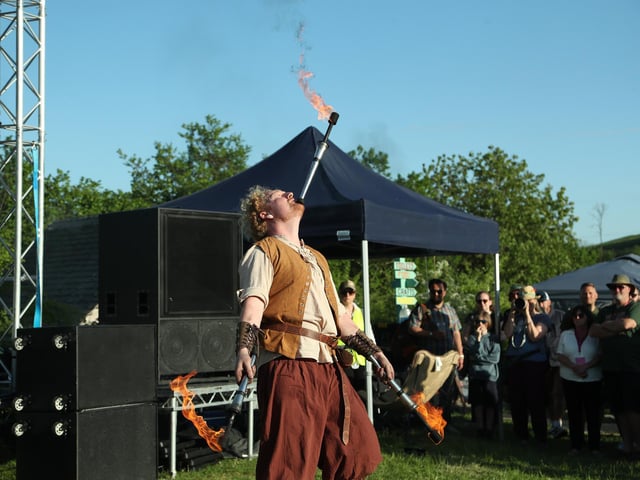 Fire performers at the Beltain Festival on Butser Ancient Farm