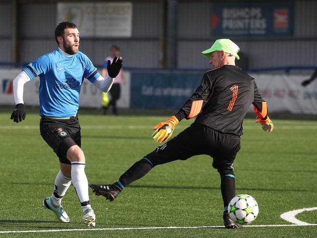 Eastney's Harry Knight is about to be fouled by the Freehouse goalkeeper, resulting in a penalty
Picture: Stuart Martin
