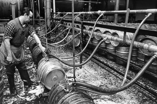 Racking or felling the casks of draught beer at Brickwoods Brewery in 1971. Picture: The News 2203-1