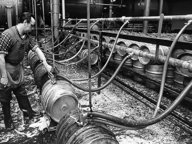 Racking or felling the casks of draught beer at Brickwoods Brewery in 1971. Picture: The News 2203-1