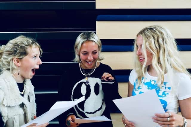 Students at Portsmouth High School receiving their results today. Picture left to right: Phoebe Harris, Daisy Cole, Bella Mangnall, all receiving four A's. Picture: Chris Moorhouse.