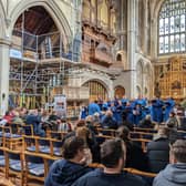 The St Mary’s parish choir sings while the scaffolding is up for the Organ Project, St Mary’s Church, Fratton .