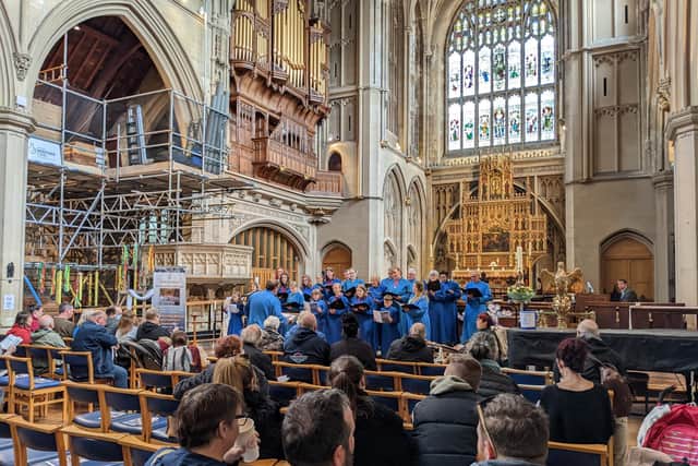 The St Mary’s parish choir sings while the scaffolding is up for the Organ Project, St Mary’s Church, Fratton .