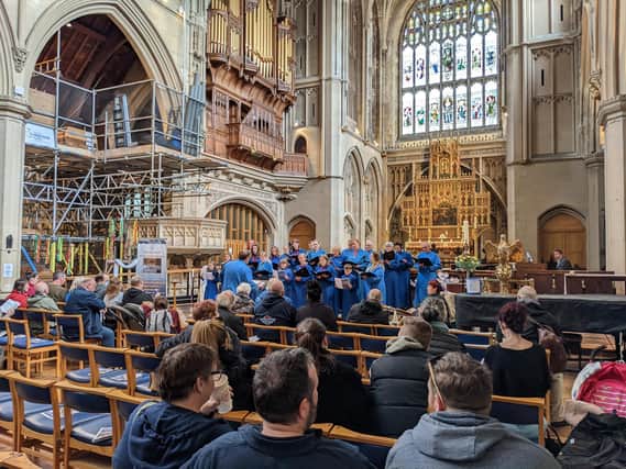 The St Mary’s parish choir sings while the scaffolding is up for the Organ Project, St Mary’s Church, Fratton .