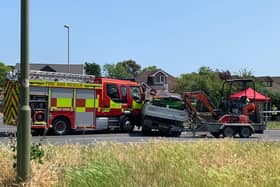 A fire engine collided with a truck towing a digger in Hulbert Road, Leigh Park, this morning (June 16). Picture: Sarah Standing.
